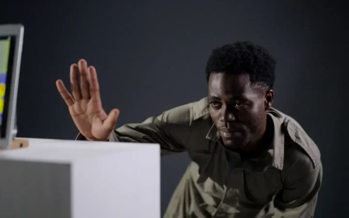 Man pointing at a thermal heat map on a screen
