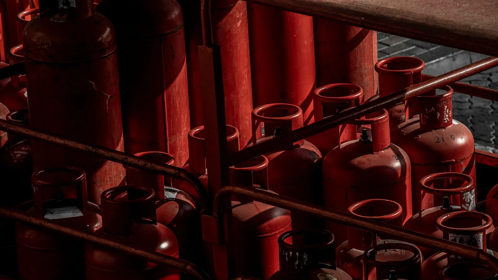 Rows of red propane cylinders