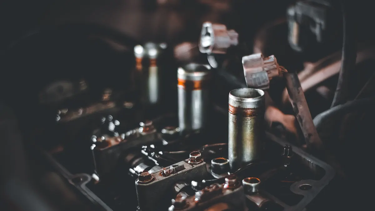 Close-up of engine parts on a workbench