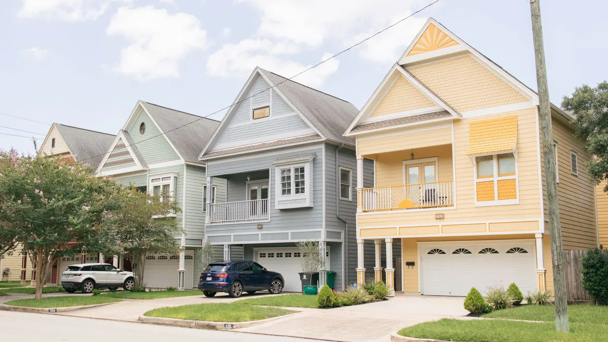 Row of houses close together on a residential street